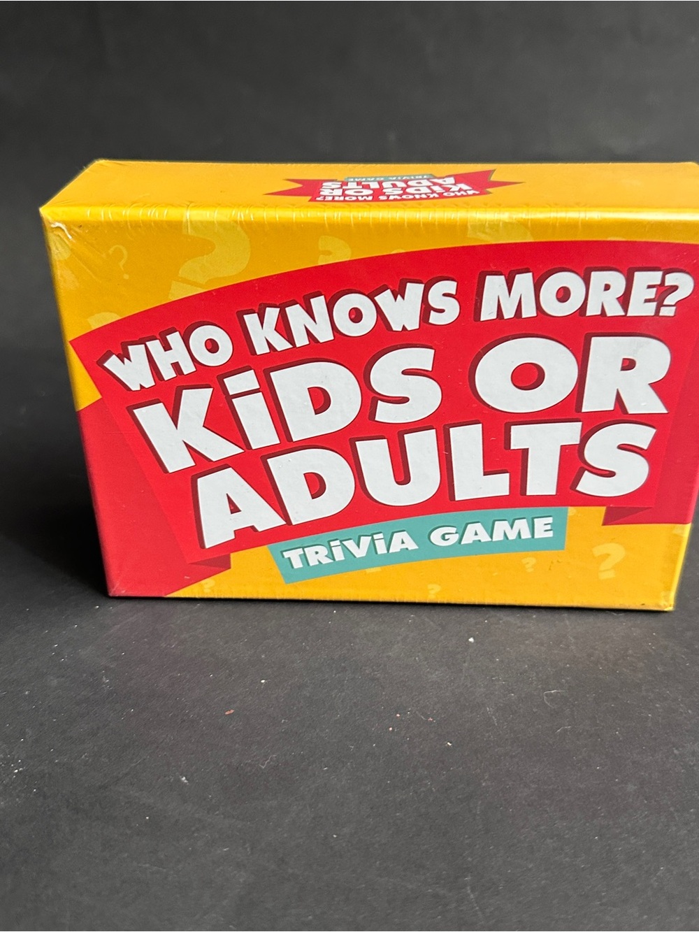 NEW- Who Knows More? Kids or Adults Trivia Game - Yellow/Red